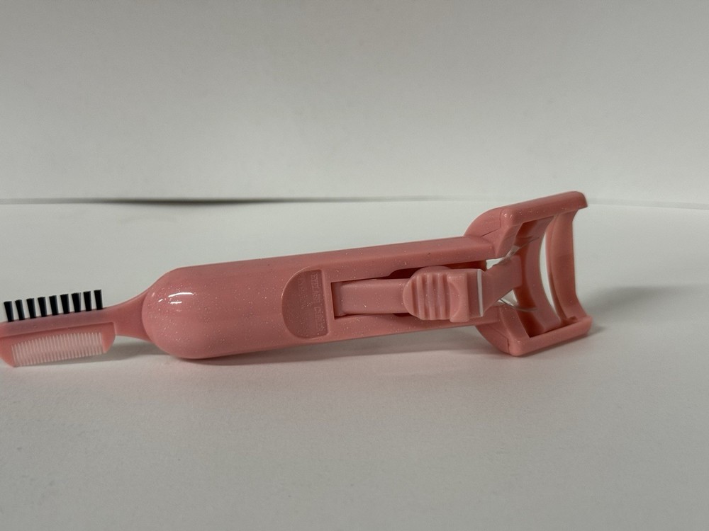 Eyelash curler & eyebrow brush