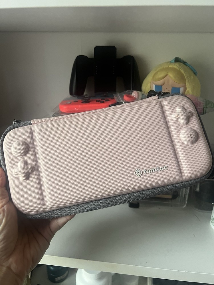 Nintendo Switch Console w/ Joy-Con, Grip, tomtoc Case, Thumb Grips