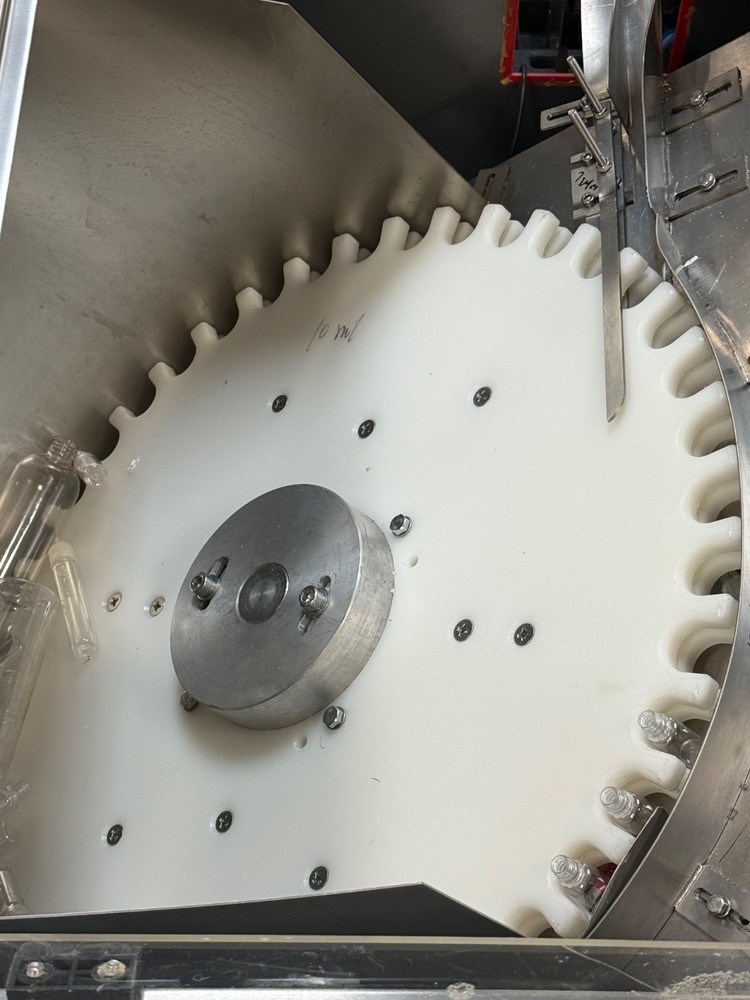 Automatic Liquid Filling and Capping Machine – MACHINE NAME - UNSCRAMBLE