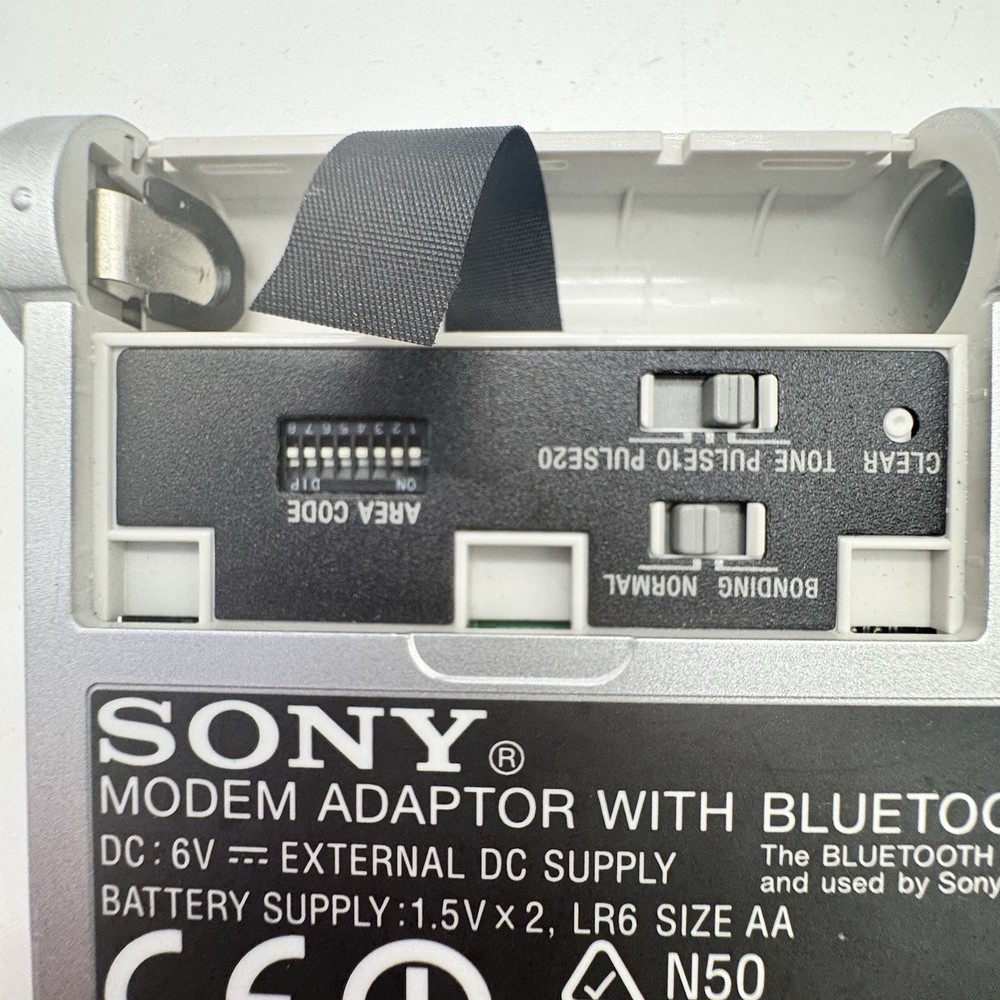 Sony BTA-NW1 Silver Bluetooth Function Modem Adapter w/ MDM-5614G PC Card Modem
