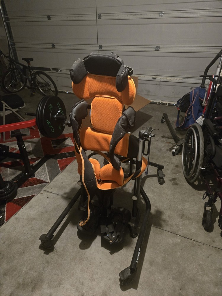 Leckey Movement Trainer Adjustable Height Backrest Orange Black Child 4-Wheel