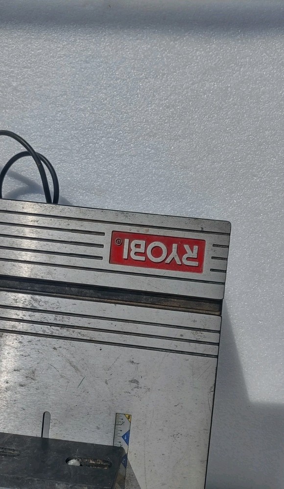 Ryobi Router Table with a mounted Router