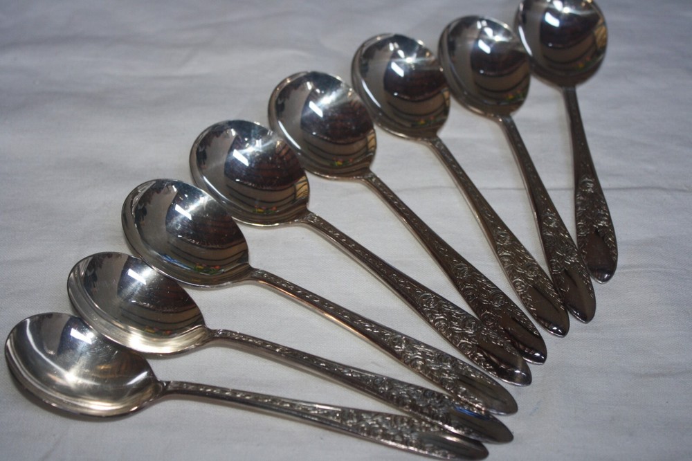 NATIONAL SILVER CO. SILVER PLATED FLATWARE "ROSE & LEAF" (8) CREAM SOUP SPOONS