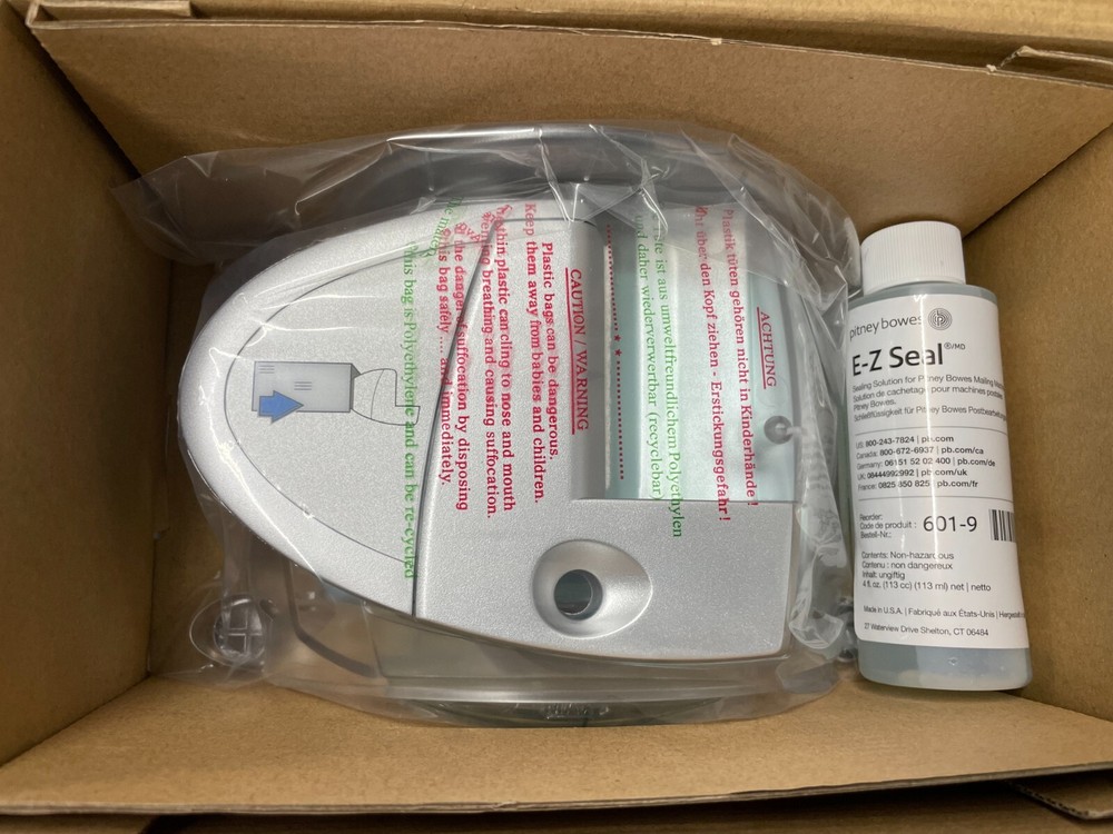 Envelope moistener/sealer