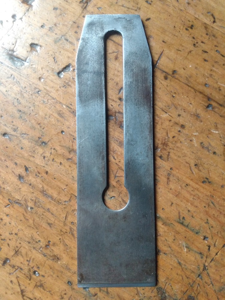 STANLEY 2" V-LOG0 (distressed) PLANE BLADE. READ FULL DESCRIPTION.