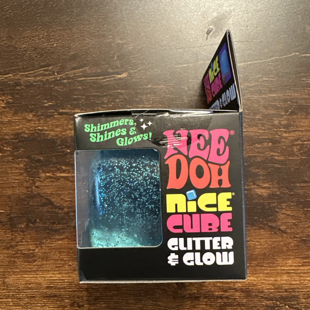 The Needoh Nice Cube Glitter & Glow BLUE, Super Solid Squish Ball