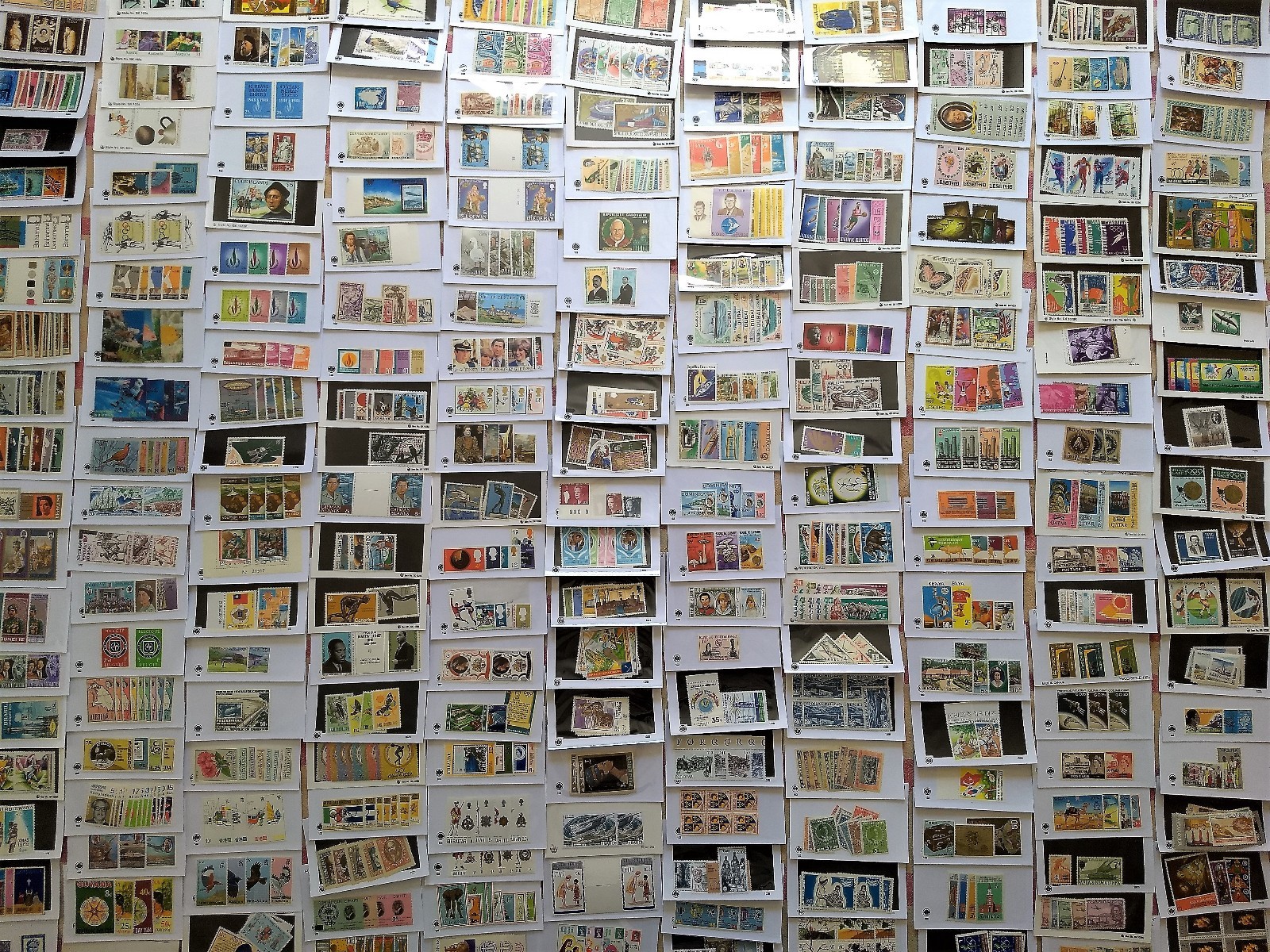 Worldwide Stamp Assortment Mint 100 Different Stamps from 20 Countries Full Sets