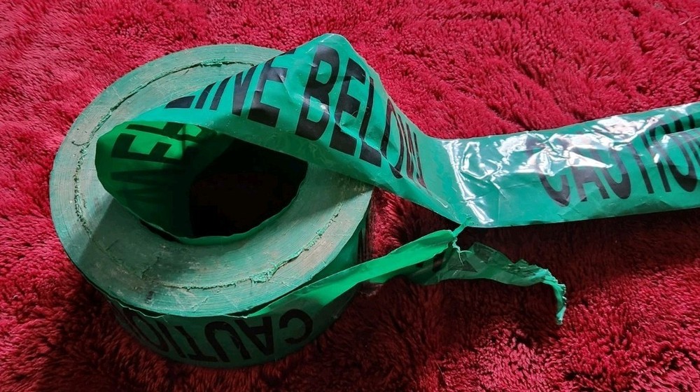 Partial Roll Sewer Line Below Caution Tape 3 Inch Green