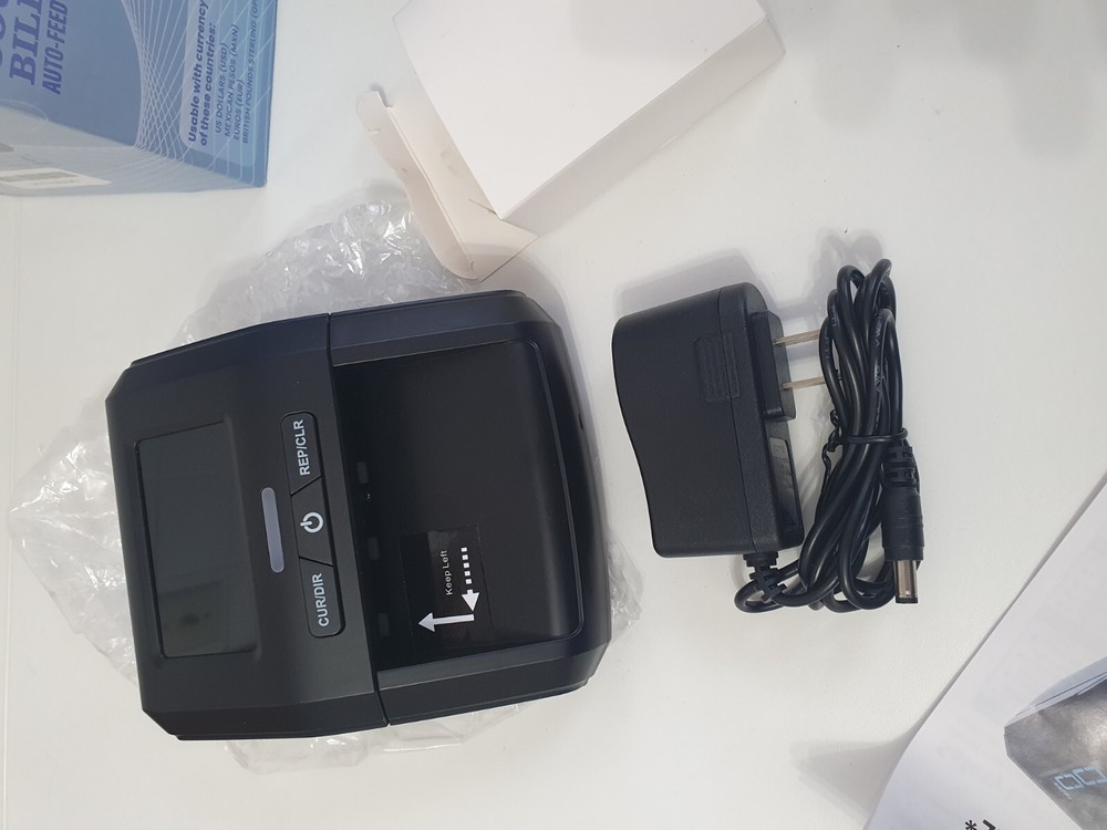 Counterfeit Bill Detector