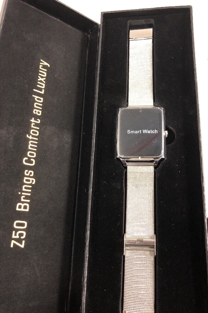 TechComm Z50 Smart Watch with 0.3 MP Camera GSM Bluetooth Touch Screen