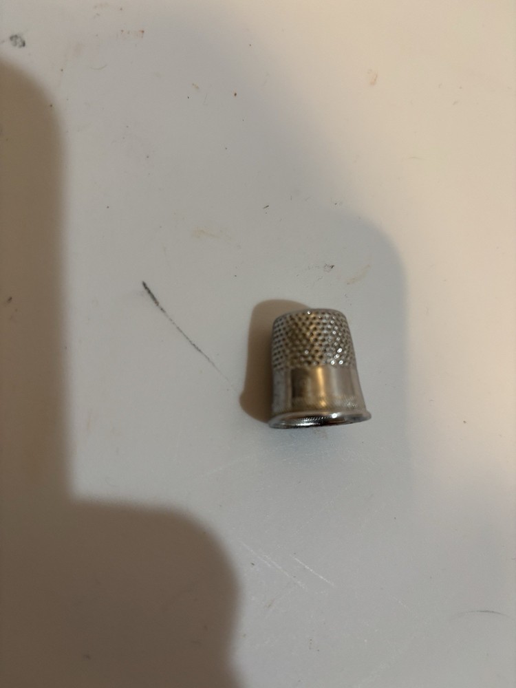 Five thimbles. Sizes 8, 9, 9,10,11