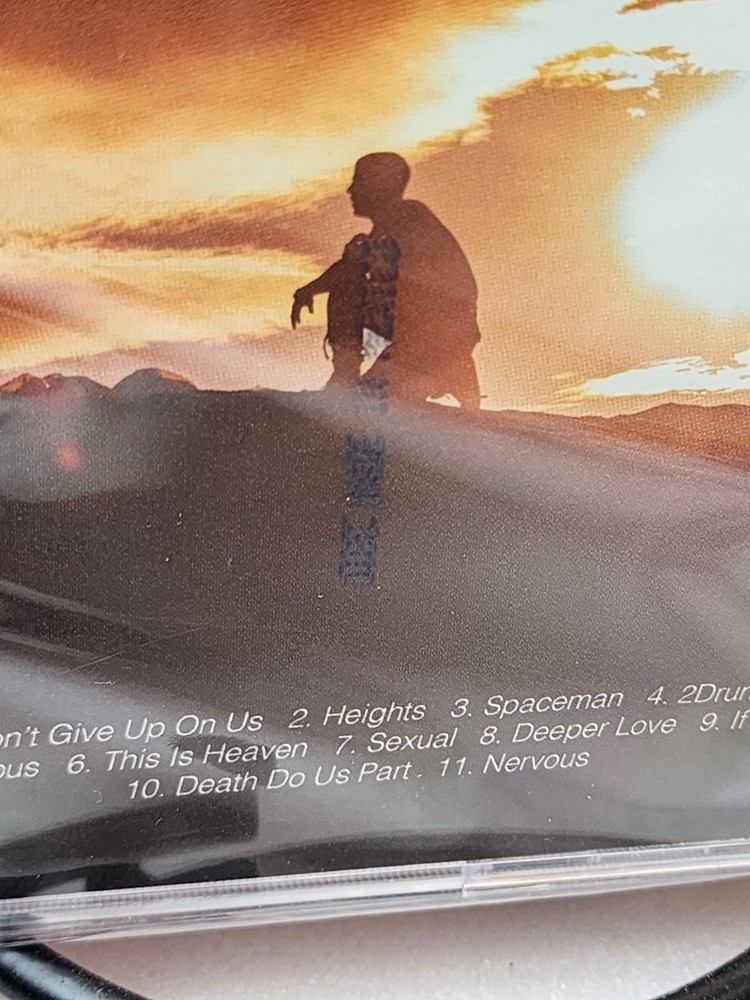 Nick Jonas Spaceman & What A Man Gotta Do Signed CD & Booklet Set
