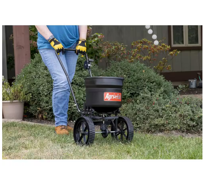 SEED SPREADER 50-Lb Push Broadcast Seeder