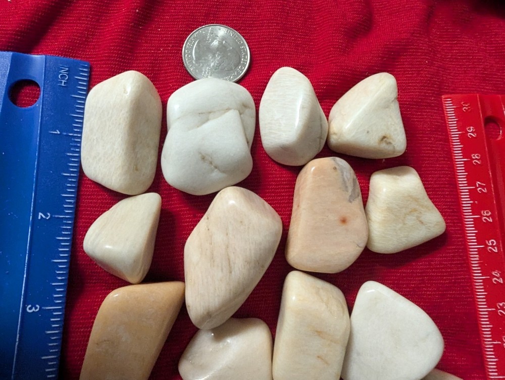 2 Off white large tumbled gemstones per lot.