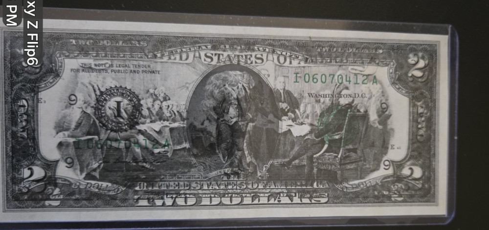 $2 bill over printed mint error