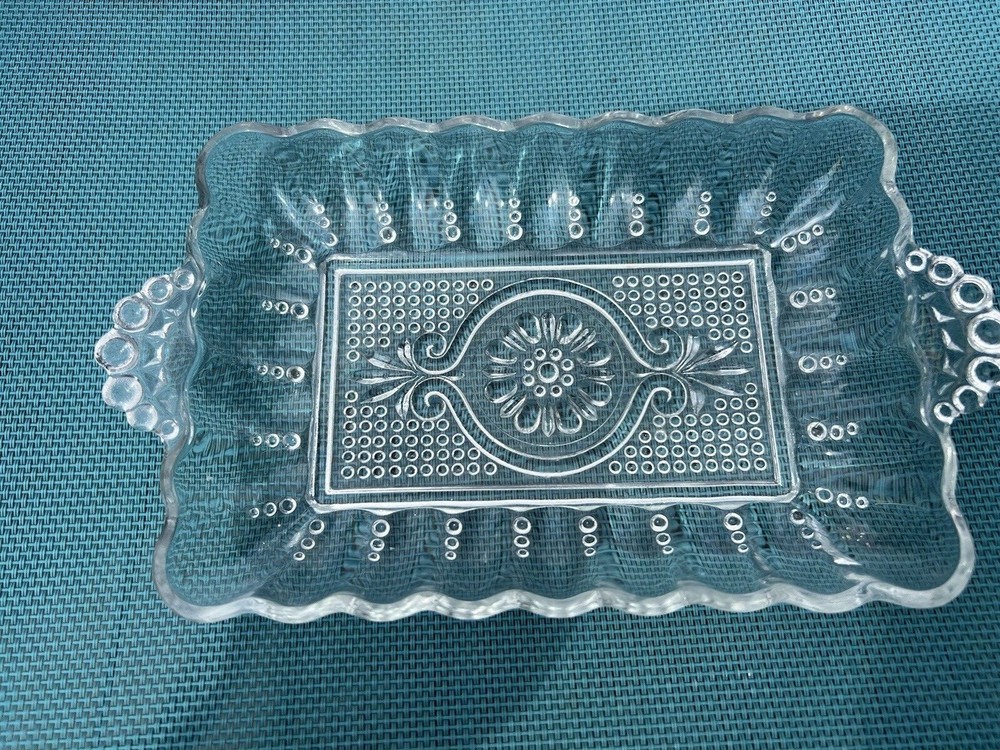 small rectangle shape crystal server with handles.  In good condition.