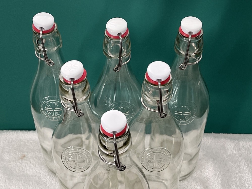 Six Empty Wine Bottles With Stoppers Clear Glass