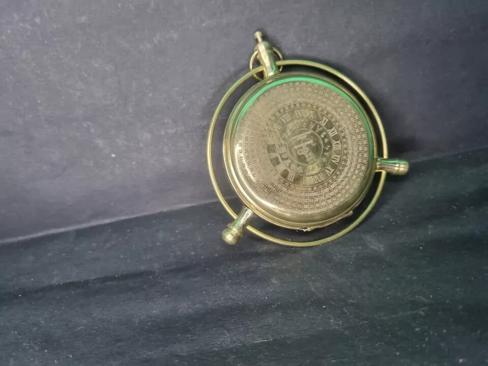 Golden Compass Alethiometer Symbol reader Truth measure