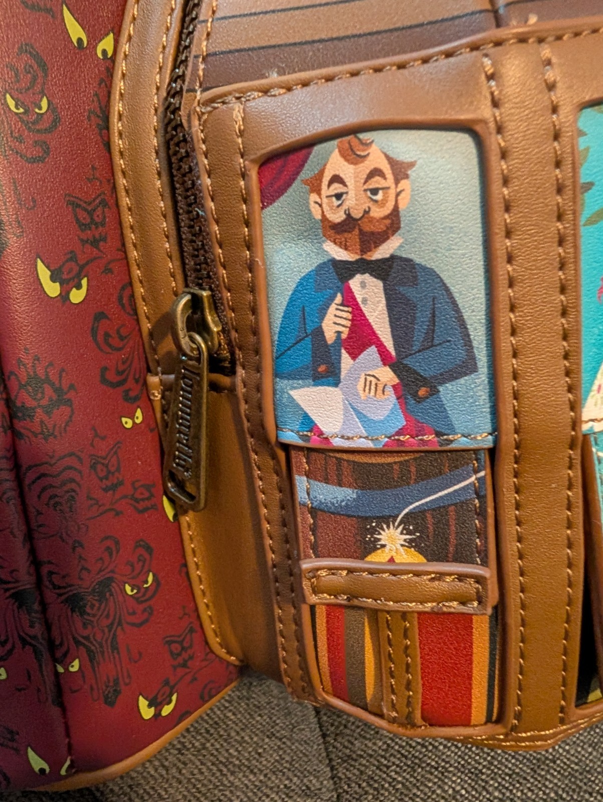 Disney Haunted Mansion Stretching Room Portraits Glow-in-the-Dark Mini Backpack