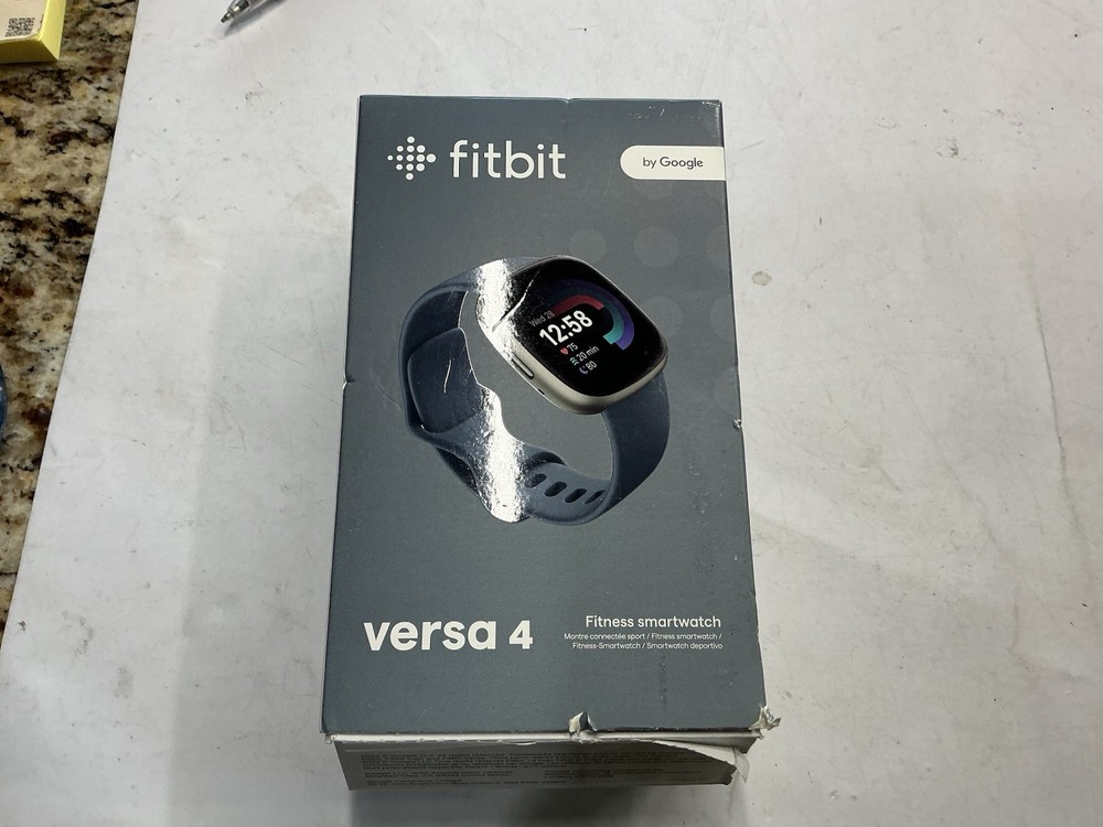 Fitbit Versa 4 Activity Tracker - Waterfall Blue/Platinum