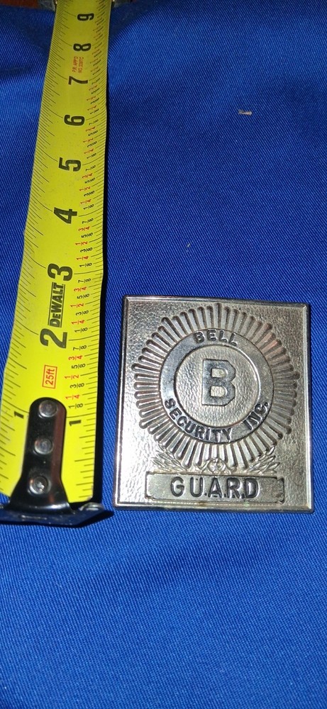 obsolete Bell Security Guard square badge.