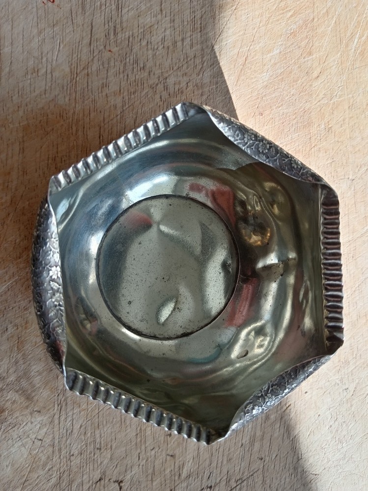 Silver plated very ornate rose bowl.