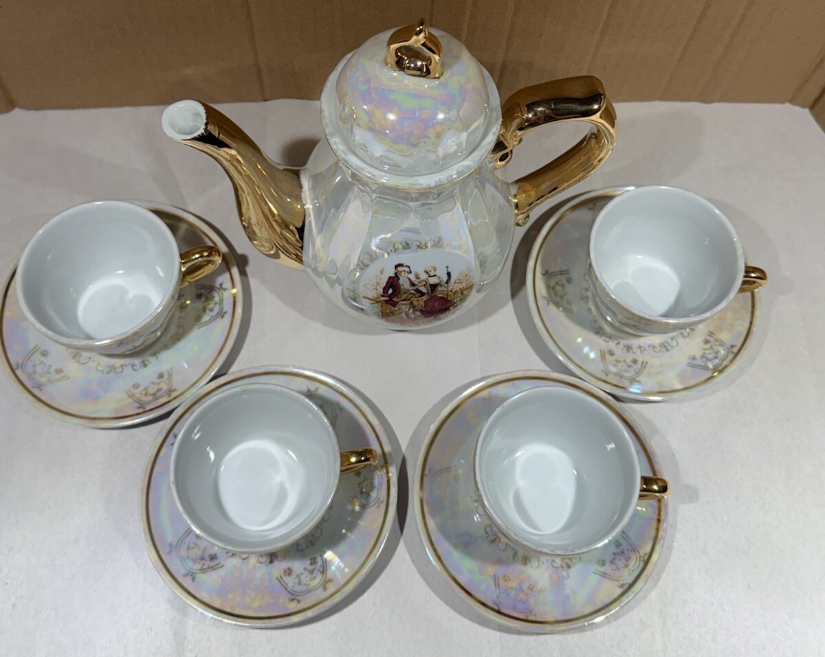 Romeo And Juliet Tea Pot 4 Tea Cups 4 Saucers Gold Trim Handles Iridescent White