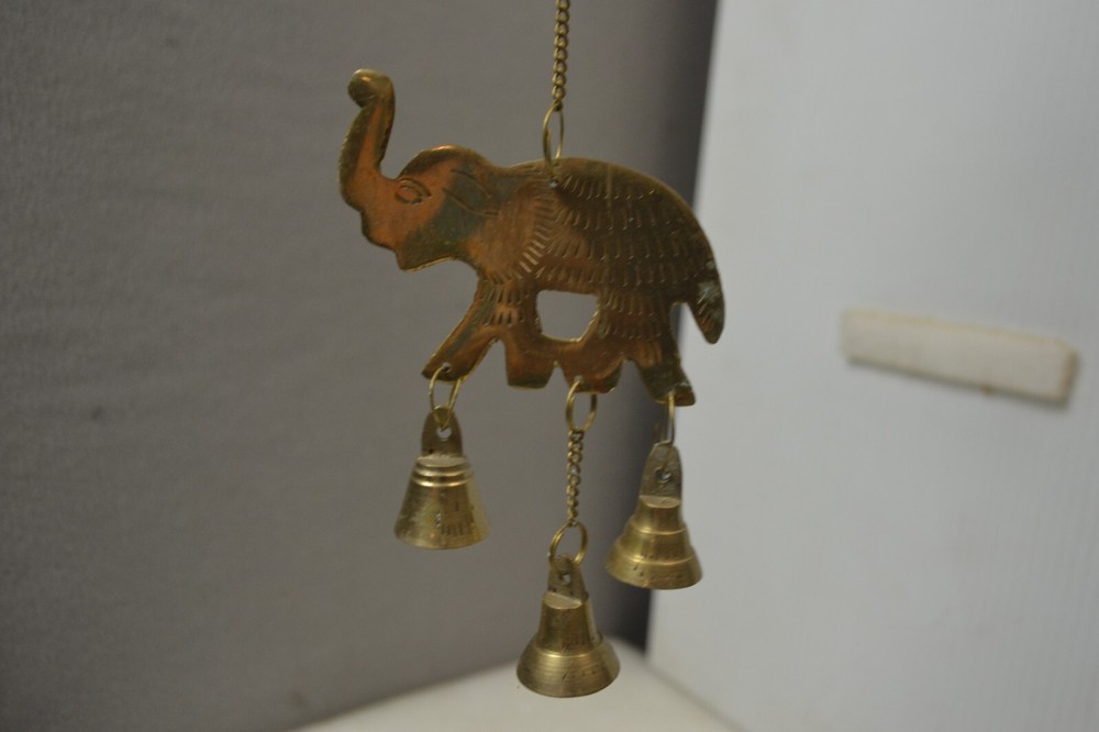 Brass elephants hanging chime with bells