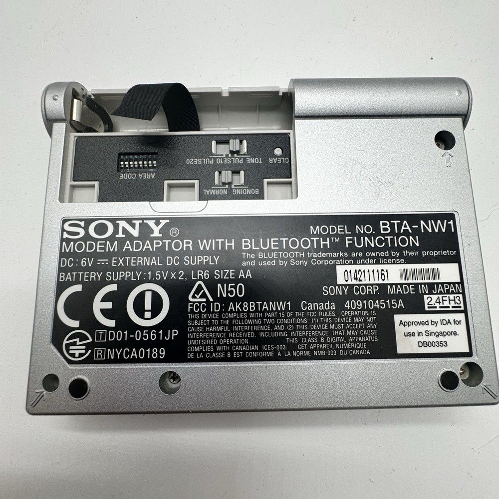 Sony BTA-NW1 Silver Bluetooth Function Modem Adapter w/ MDM-5614G PC Card Modem