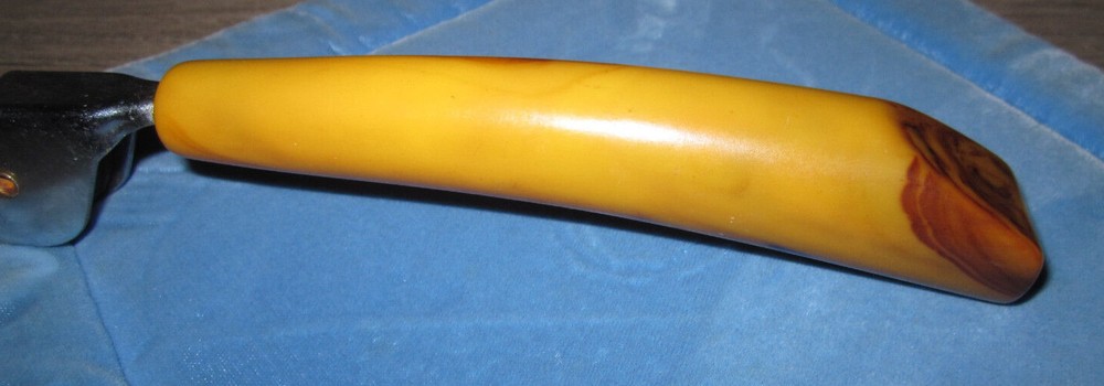 Vintage butterscotch Bakelite handle pull through knife sharpener