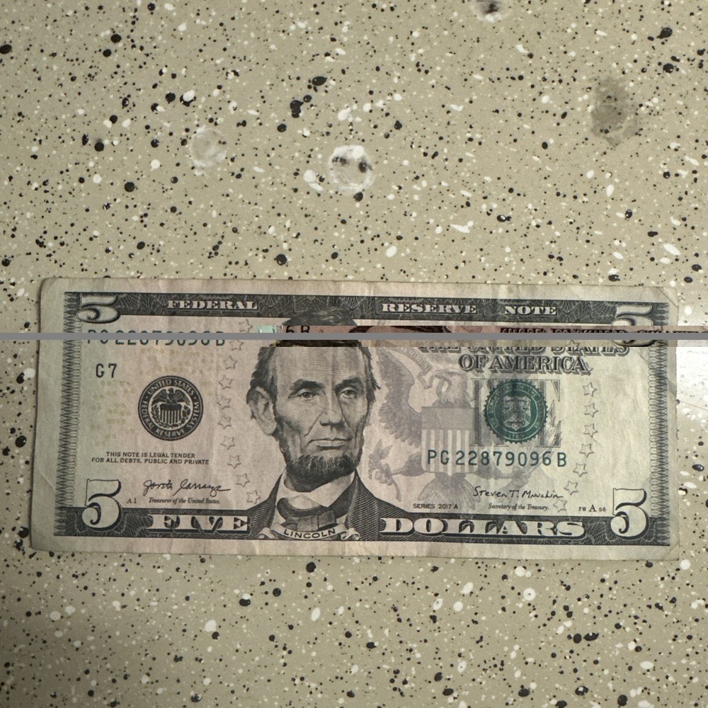 Misaligned, miscut $5 bill RARE