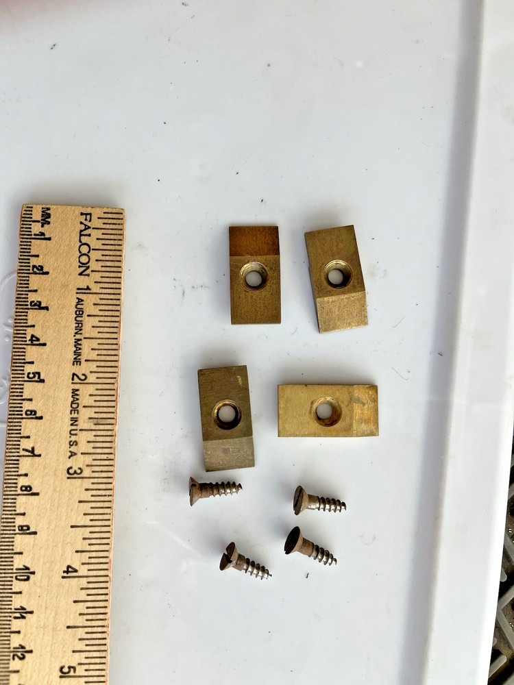 4 original E Howard large movement mounting brass clips