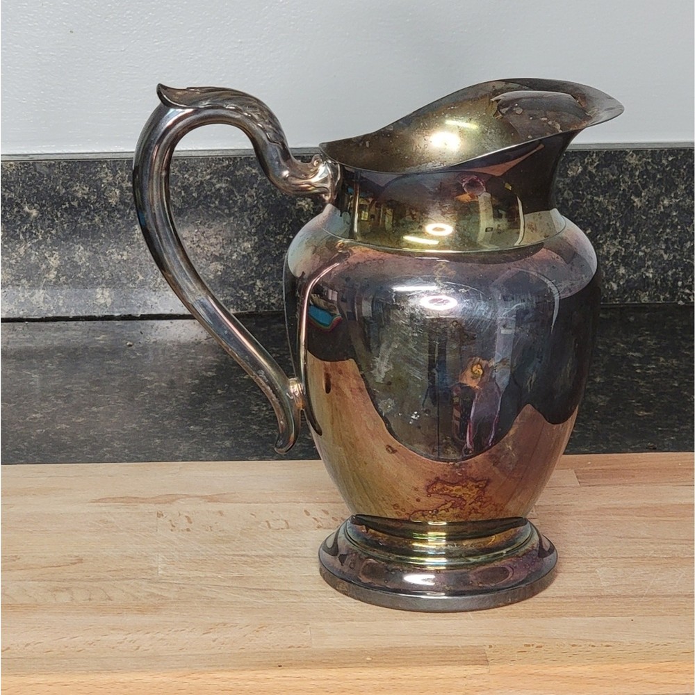Silver antiqued distressed pitcher