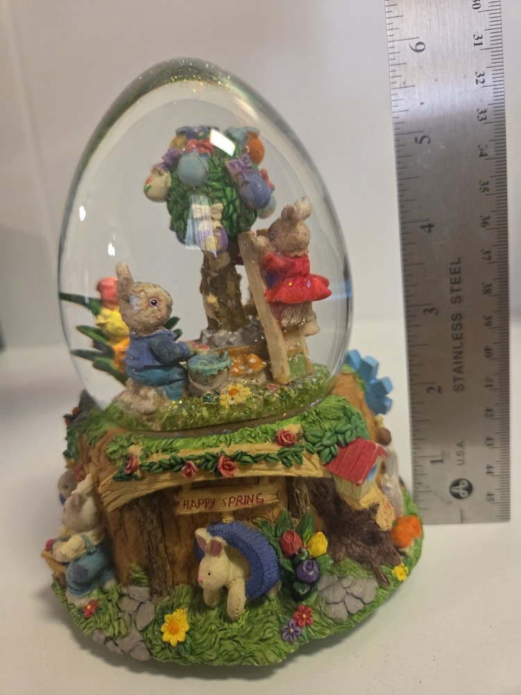 Springtime/Easter musical egg shaped glitter globe plays "Easter Parade"