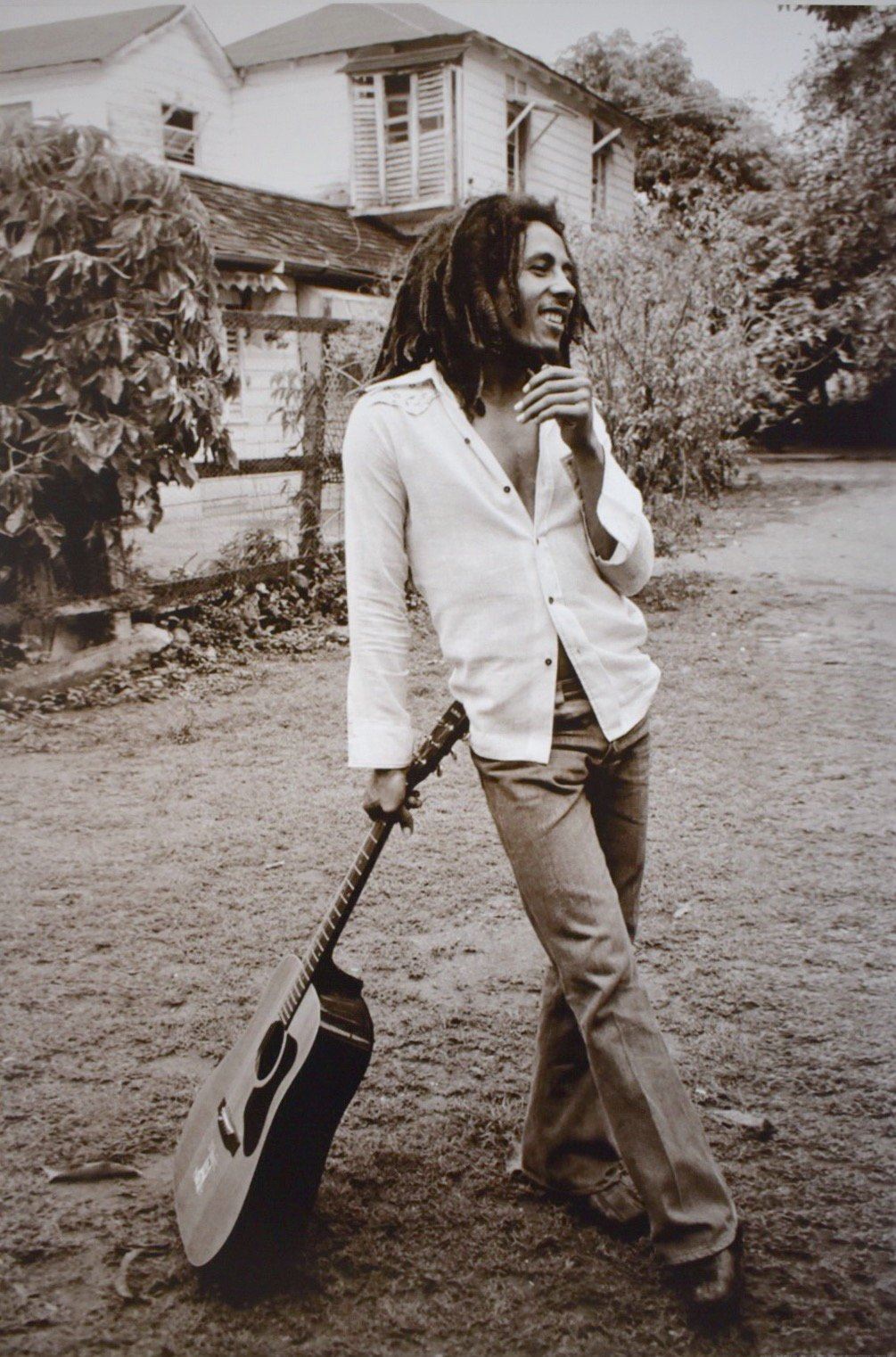 Bob Marley Leaning on his Guitar In Sepia Poster 24 x 36