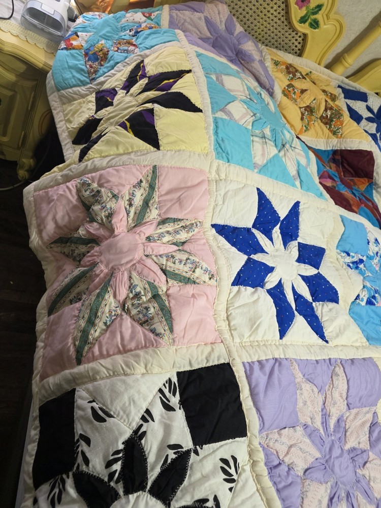 vintage handmade quilt featuring The Sunflower Pattern
