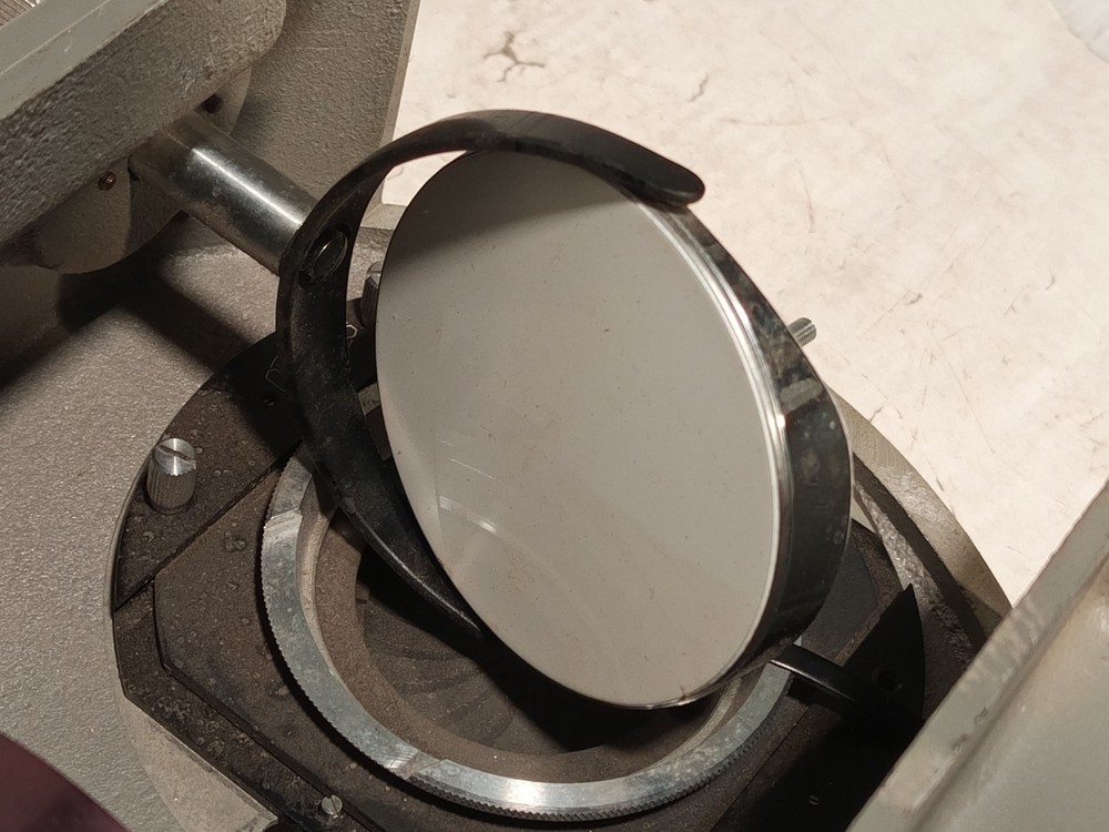 Olympus Tokyo microscope base w/ iris diaphragm, rotating stage, mirror shown