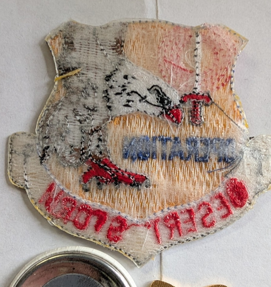 Operation Desert Storm pinback button, yellow ribbon pin, and patch