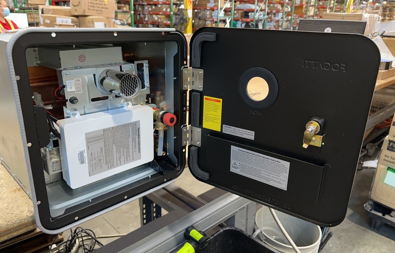 Used 2.5GPM RV Tankless Water Heater 48,000 BTU with 15x15 Black Door