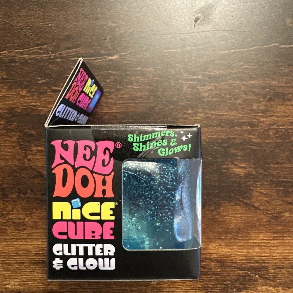 The Needoh Nice Cube Glitter & Glow BLUE, Super Solid Squish Ball