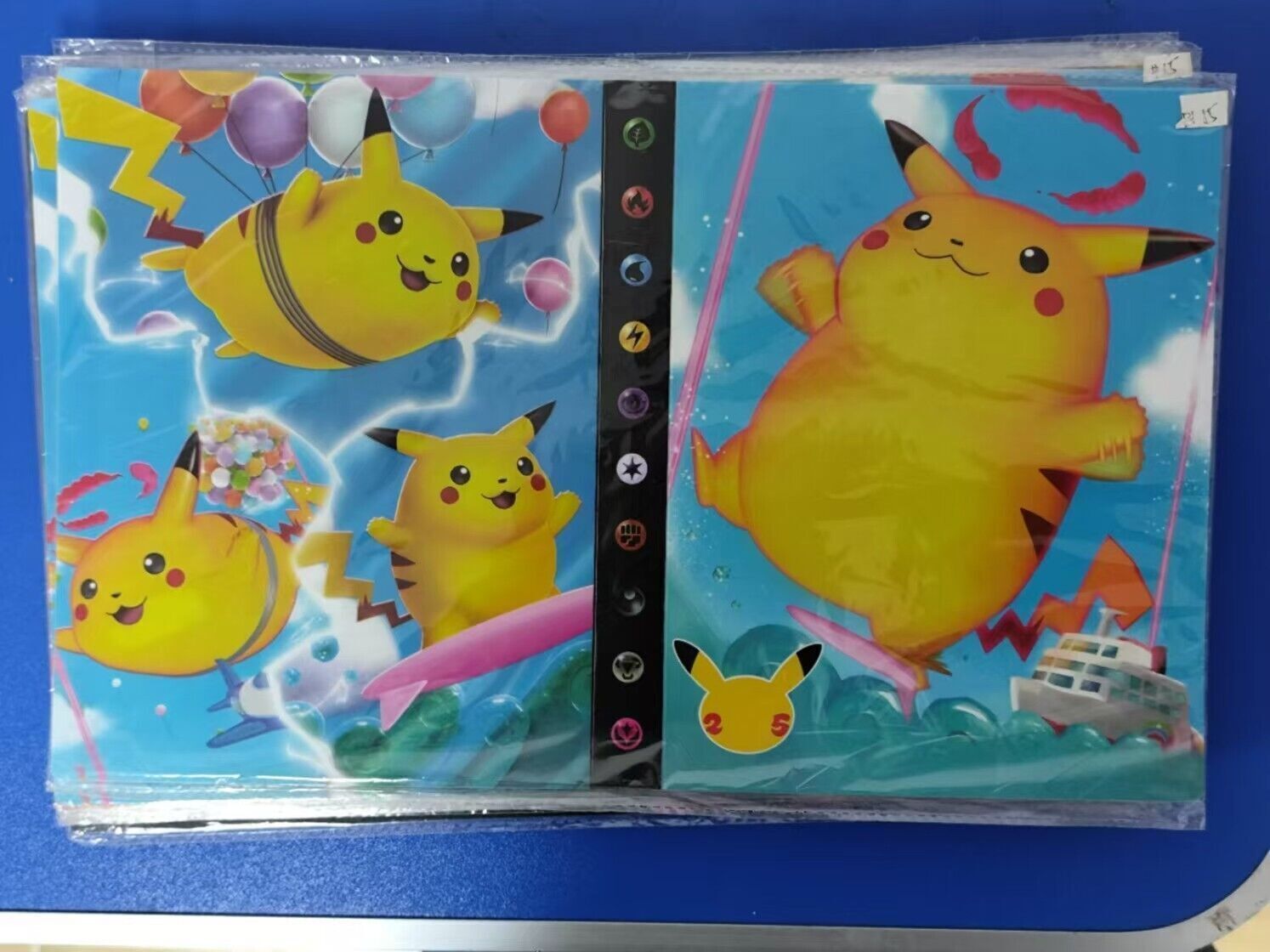 55 randomized Pokémon cards + booklet with 120 cards 4 cards per page New!