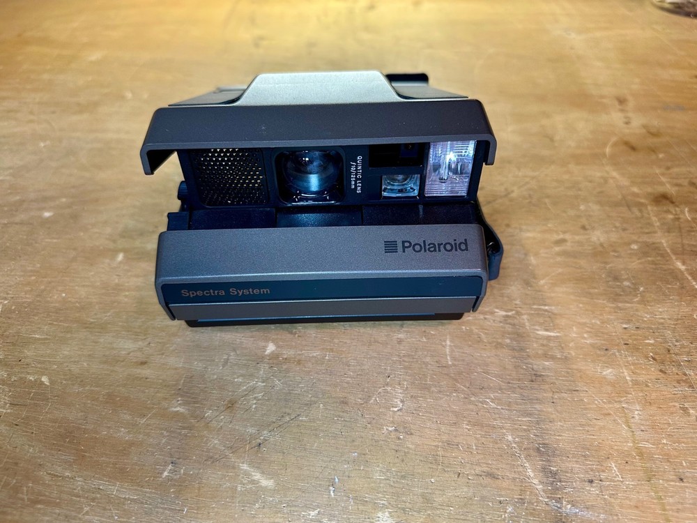 POLAROID SPECTRA SYSTEM CAMERA WITH STRAP CASE & MANUAL UNTESTED