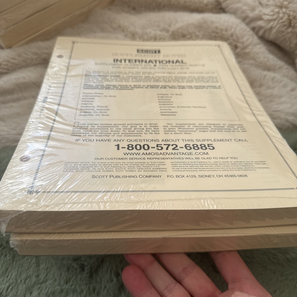 2016 Scott International Stamp Supplement # 52 A & B