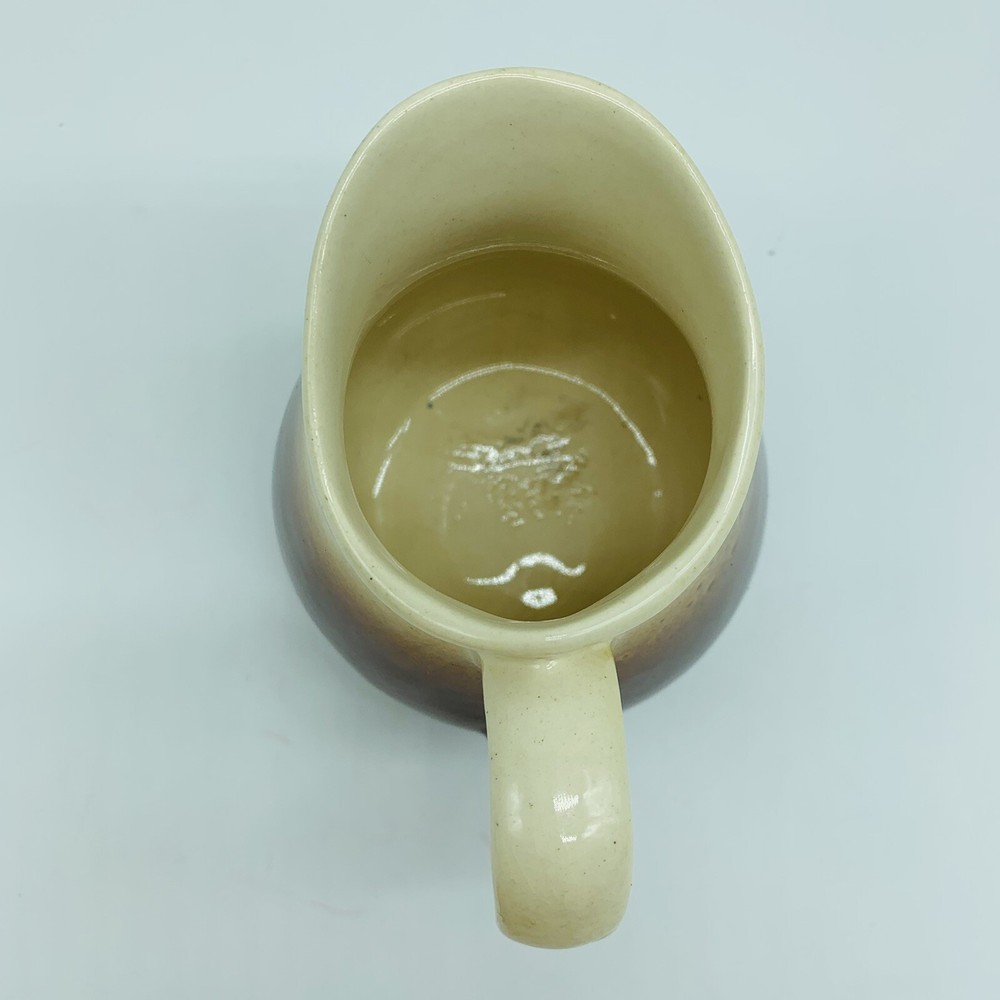 Small brown and white creamer 4.5”