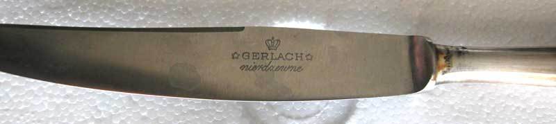 A FINE SET OF 6 SOLID SILVER GERMAN KNIVES