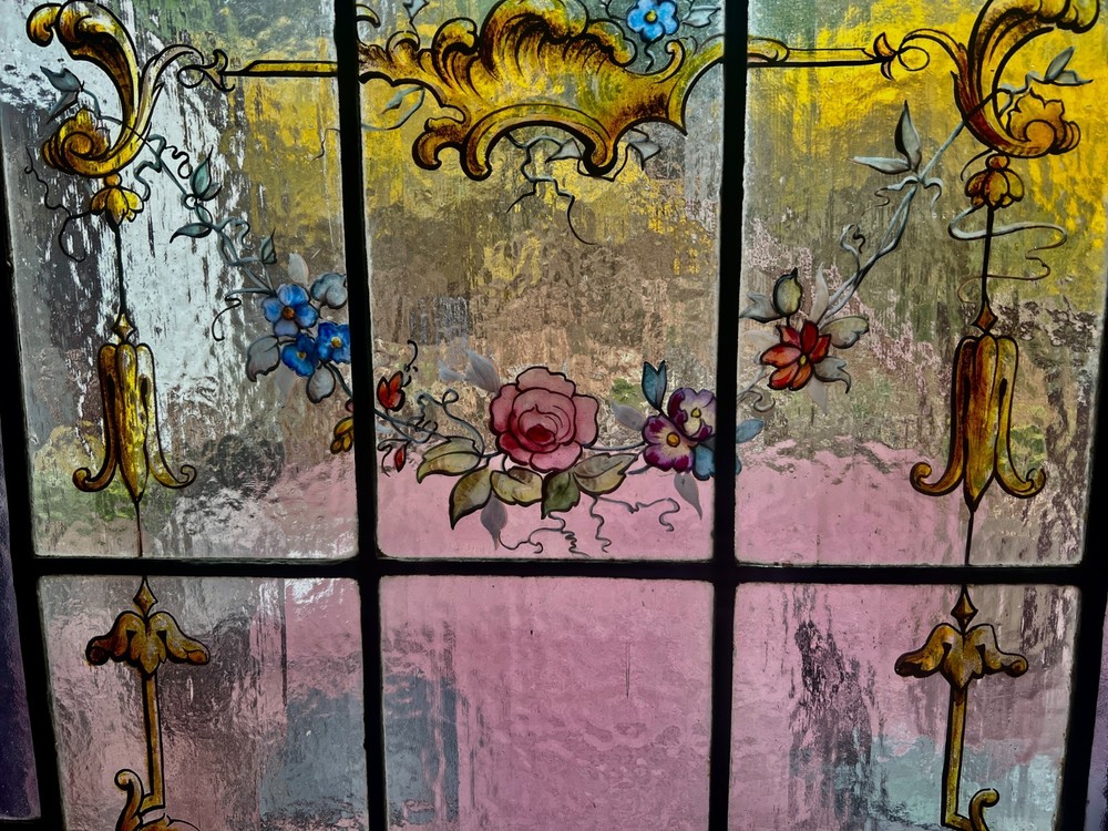 Painted and fired floral stained glass window