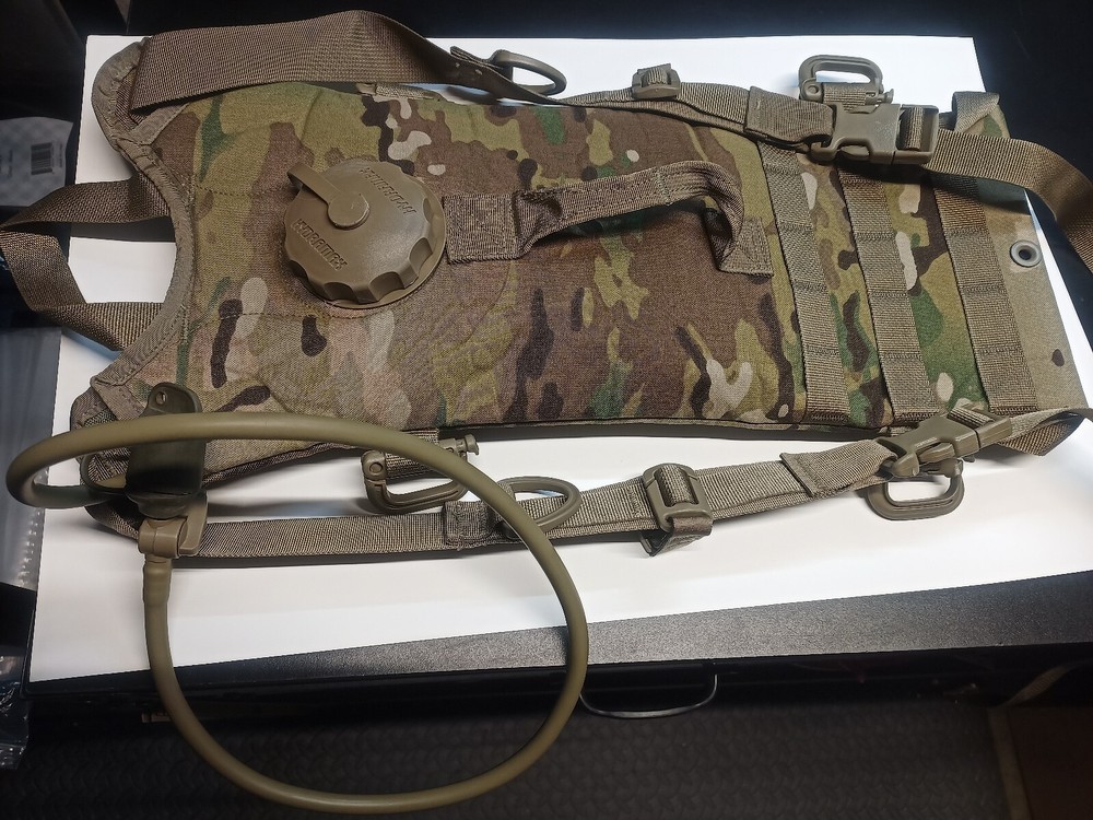 GENUINE US MULTI-CAMO HYDRATION BACKPACK SYSTEMS. PRE OWNED- USED UNITS.
