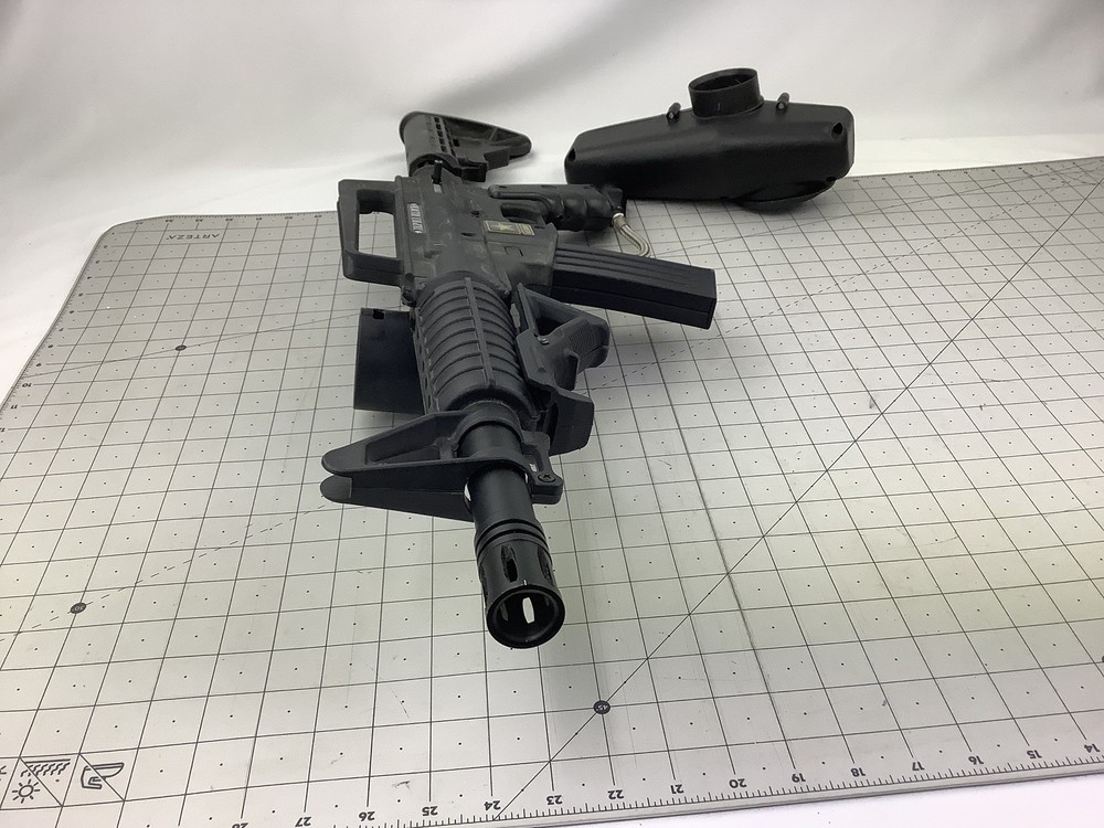 Tippmann Alpha black paintball marker with e trigger and cyclone feed untested