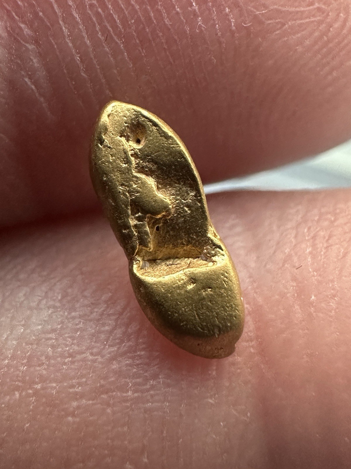 Gold nugget from Papua New Guinea, 0.702 grams