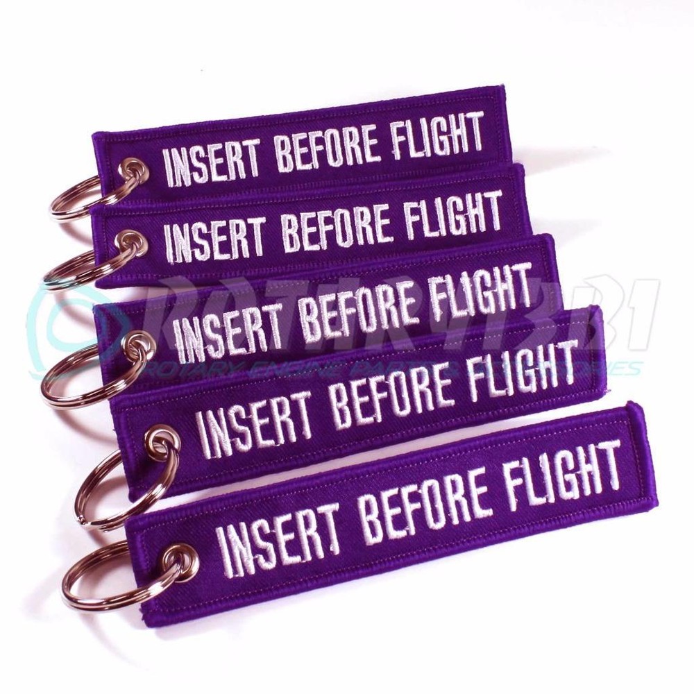 INSERT BEFORE FLIGHT KEYCHAIN PURPLE/white QTY = 5 PCS RING TAGS